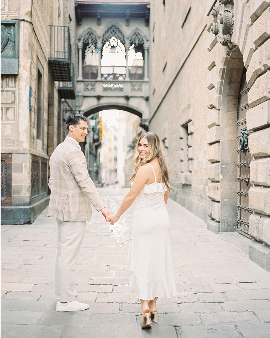 Engagement shoot with a couple in Barcelona, showcasing natural moments and film photography style