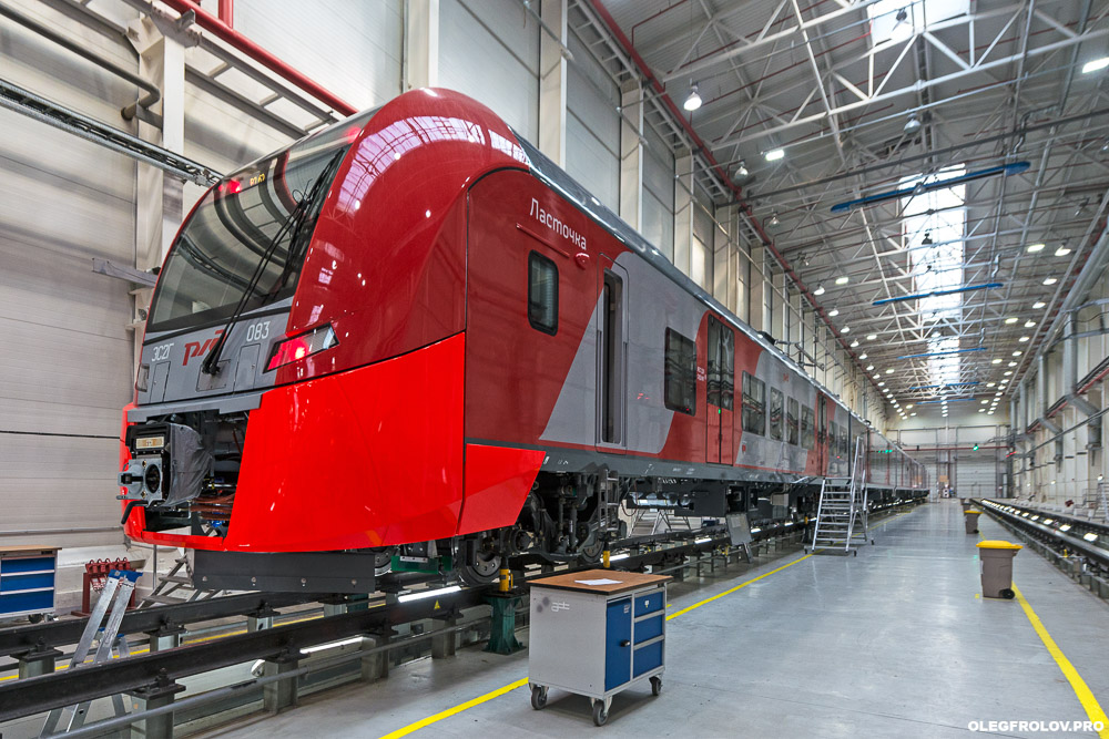 Производство скоростных поездов Ласточка компании Siemens, Моторвагонное депо скоростных поездов Ласточка, промышленный репортаж с предприятия, вагоностроительный завод в Екатеринбурге, железнодорожный транспорт, скоростные поезда, железная дорога,  Промышленная фотосъемка завода Уральские локомотивы, железнодорожный транспорт, локомотив, электричка, Ласточка, поезд, железная дорога, производство поездов, производство локомотивов, репортаж на заводе, Екатеринбург, поезда сименс, поезда ласточка, скоростной поезд, рекламная фотосъемка поезда, подвижной состав, сборочный конвейер, сборка проездов, вагоны сименс, вагоны ласточка,  новые поезда, фотосъемка поездов, промышленный фотограф Екатеринбурга, Промышленный репортаж, Производственный репортаж, Репортажно-постановочная фотосъёмка на производстве, постановочная фотосъемка промышленности, промышленный фотограф, промышленная съемка, промышленная аэросъемка, промышленная фотография, промышленность, фотограф промышленности, фотограф промышленных объектов, фотосъемка рабочего процесса, фотосъемка завода, аэросъемка атомной станции, аэросъемка промышленно предприятия, промышленная съемка строительного объекта,   