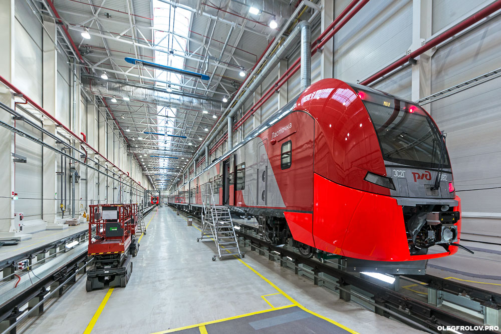 Производство скоростных поездов Ласточка компании Siemens, Моторвагонное депо скоростных поездов Ласточка, промышленный репортаж с предприятия, вагоностроительный завод в Екатеринбурге, железнодорожный транспорт, скоростные поезда, железная дорога,  Промышленная фотосъемка завода Уральские локомотивы, железнодорожный транспорт, локомотив, электричка, Ласточка, поезд, железная дорога, производство поездов, производство локомотивов, репортаж на заводе, Екатеринбург, поезда сименс, поезда ласточка, скоростной поезд, рекламная фотосъемка поезда, подвижной состав, сборочный конвейер, сборка проездов, вагоны сименс, вагоны ласточка,  новые поезда, фотосъемка поездов, промышленный фотограф Екатеринбурга, Промышленный репортаж, Производственный репортаж, Репортажно-постановочная фотосъёмка на производстве, постановочная фотосъемка промышленности, промышленный фотограф, промышленная съемка, промышленная аэросъемка, промышленная фотография, промышленность, фотограф промышленности, фотограф промышленных объектов, фотосъемка рабочего процесса, фотосъемка завода, аэросъемка атомной станции, аэросъемка промышленно предприятия, промышленная съемка строительного объекта,   