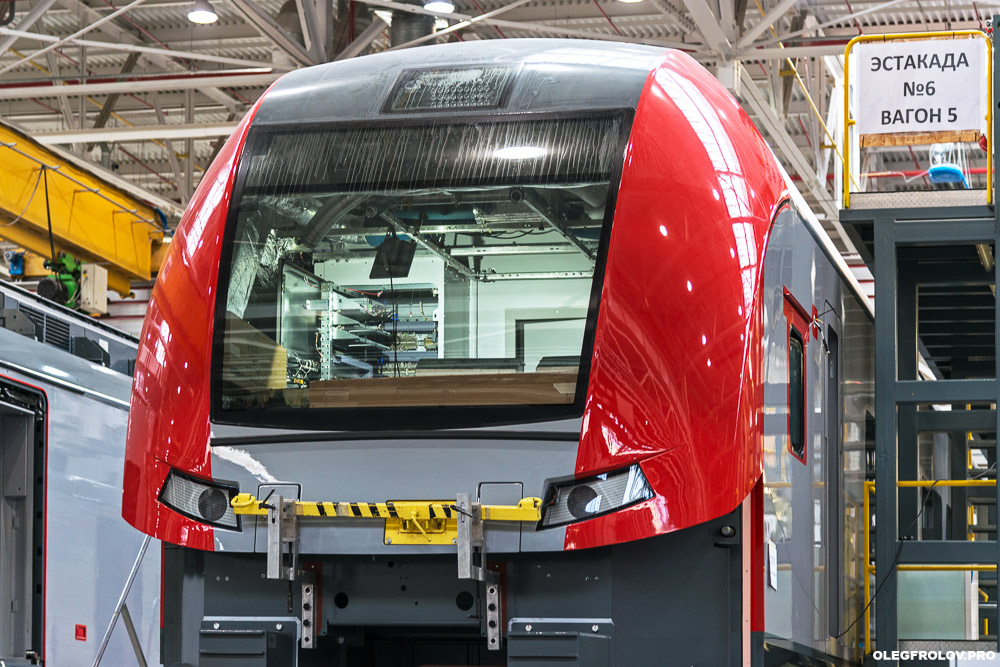 Производство скоростных поездов Ласточка компании Siemens, Моторвагонное депо скоростных поездов Ласточка, промышленный репортаж с предприятия, вагоностроительный завод в Екатеринбурге, железнодорожный транспорт, скоростные поезда, железная дорога,  Промышленная фотосъемка завода Уральские локомотивы, железнодорожный транспорт, локомотив, электричка, Ласточка, поезд, железная дорога, производство поездов, производство локомотивов, репортаж на заводе, Екатеринбург, поезда сименс, поезда ласточка, скоростной поезд, рекламная фотосъемка поезда, подвижной состав, сборочный конвейер, сборка проездов, вагоны сименс, вагоны ласточка,  новые поезда, фотосъемка поездов, промышленный фотограф Екатеринбурга, Промышленный репортаж, Производственный репортаж, Репортажно-постановочная фотосъёмка на производстве, постановочная фотосъемка промышленности, промышленный фотограф, промышленная съемка, промышленная аэросъемка, промышленная фотография, промышленность, фотограф промышленности, фотограф промышленных объектов, фотосъемка рабочего процесса, фотосъемка завода, аэросъемка атомной станции, аэросъемка промышленно предприятия, промышленная съемка строительного объекта,   