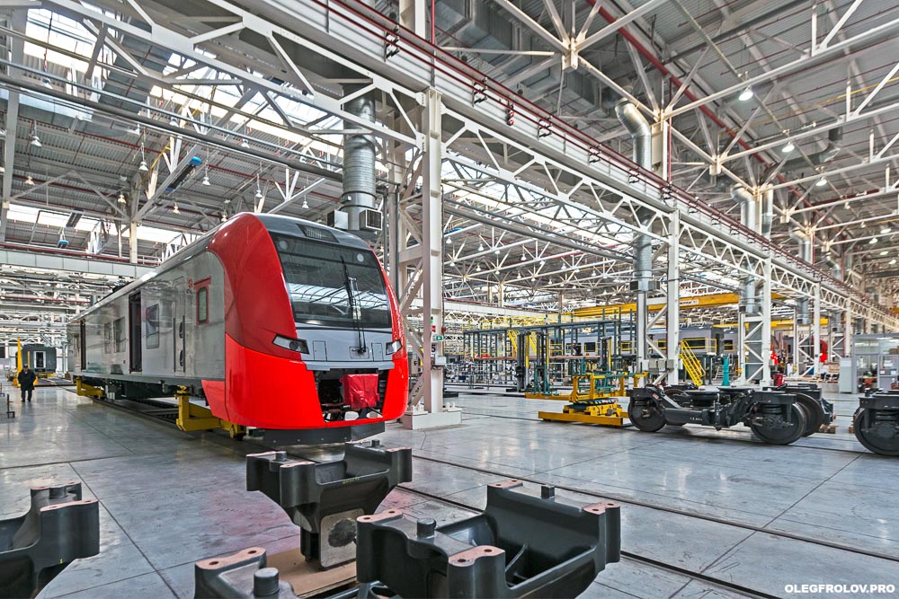 Производство скоростных поездов Ласточка компании Siemens, Моторвагонное депо скоростных поездов Ласточка, промышленный репортаж с предприятия, вагоностроительный завод в Екатеринбурге, железнодорожный транспорт, скоростные поезда, железная дорога,  Промышленная фотосъемка завода Уральские локомотивы, железнодорожный транспорт, локомотив, электричка, Ласточка, поезд, железная дорога, производство поездов, производство локомотивов, репортаж на заводе, Екатеринбург, поезда сименс, поезда ласточка, скоростной поезд, рекламная фотосъемка поезда, подвижной состав, сборочный конвейер, сборка проездов, вагоны сименс, вагоны ласточка,  новые поезда, фотосъемка поездов, промышленный фотограф Екатеринбурга, Промышленный репортаж, Производственный репортаж, Репортажно-постановочная фотосъёмка на производстве, постановочная фотосъемка промышленности, промышленный фотограф, промышленная съемка, промышленная аэросъемка, промышленная фотография, промышленность, фотограф промышленности, фотограф промышленных объектов, фотосъемка рабочего процесса, фотосъемка завода, аэросъемка атомной станции, аэросъемка промышленно предприятия, промышленная съемка строительного объекта,   