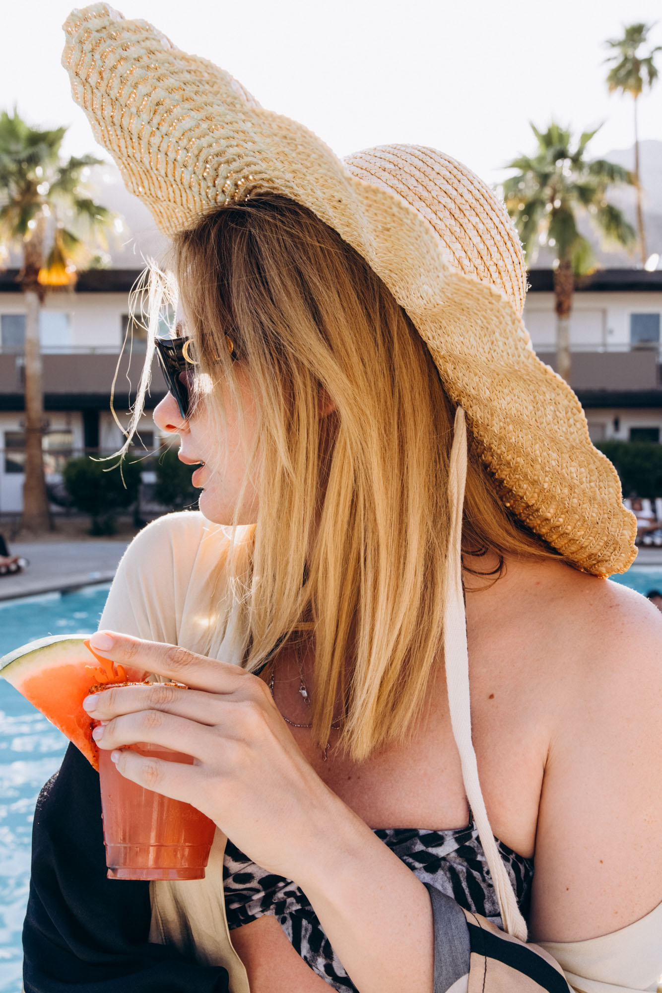 The V Palm Springs by sonder, picture of the beautiful girl near the pool with mountains on the background