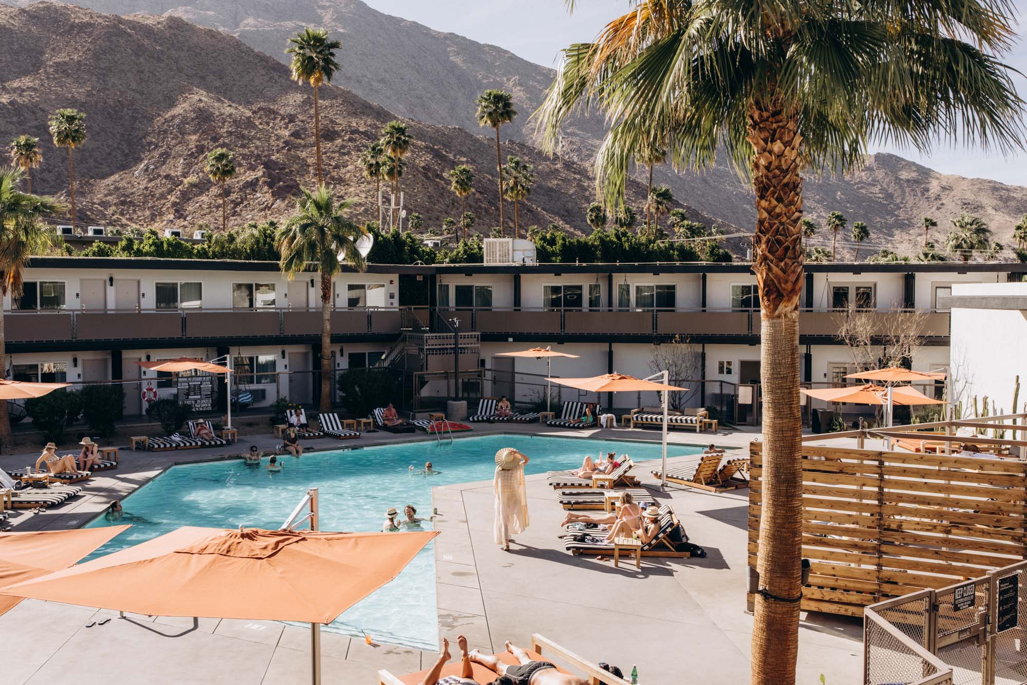The V Palm Springs by Sonder, exterior, guests are relaxing near the pool