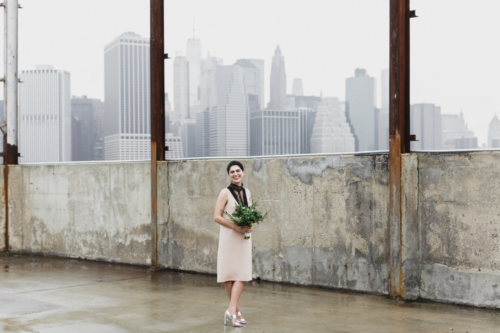 Bride on her wedding day with Manhattan skyline in the background.