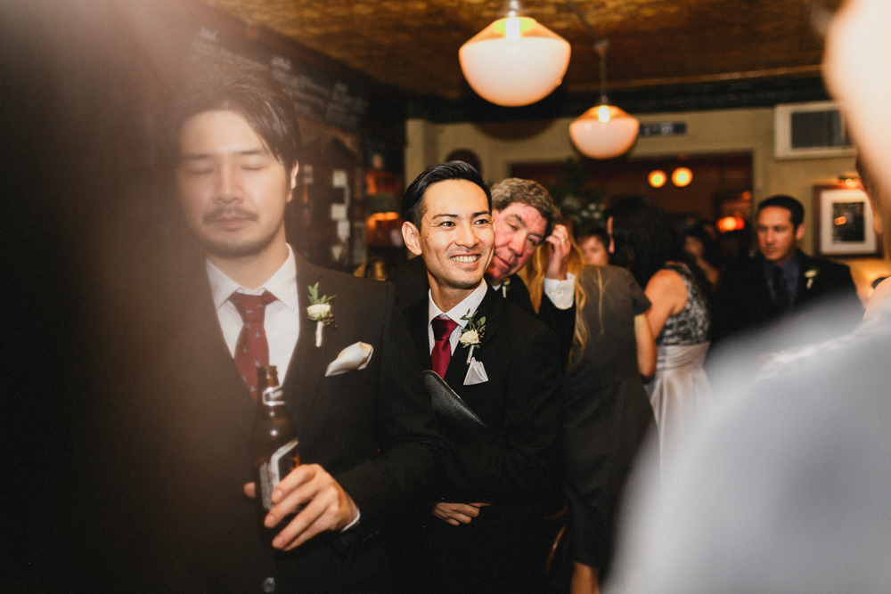 Excited guests enjoying the wedding reception at Sweetwater restaurant. Brooklyn NY