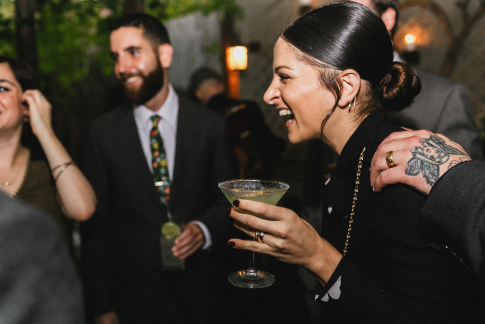 Excited guests enjoying the wedding reception at Sweetwater restaurant. Brooklyn NY
