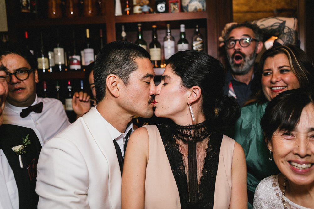 Close up of a bride and groom kissing at their reception at Sweetwater restaurant Brooklyn NY