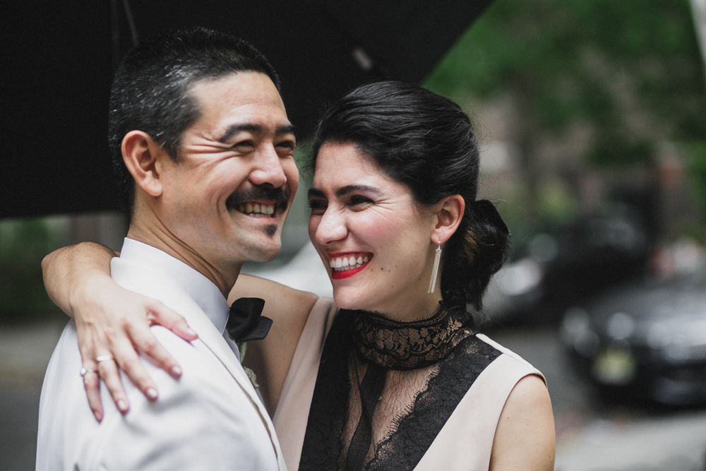 Portrait of an excited bride and groom on their wedding day in Brooklyn, NY