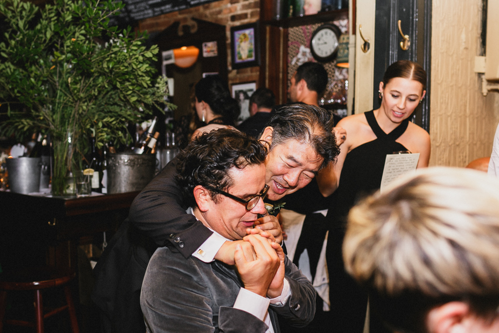 Guests enjoying an intimate wedding reception at Sweetwater restaurant in Brooklyn NY