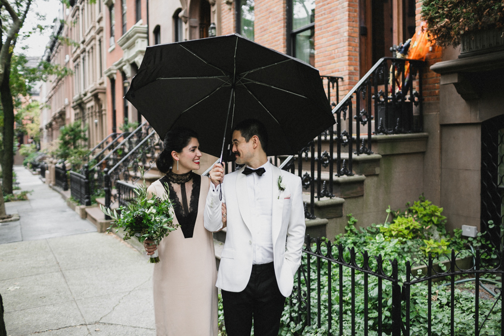 Bride and groom walking down the street in Brooklyn Heights, Brooklyn NY