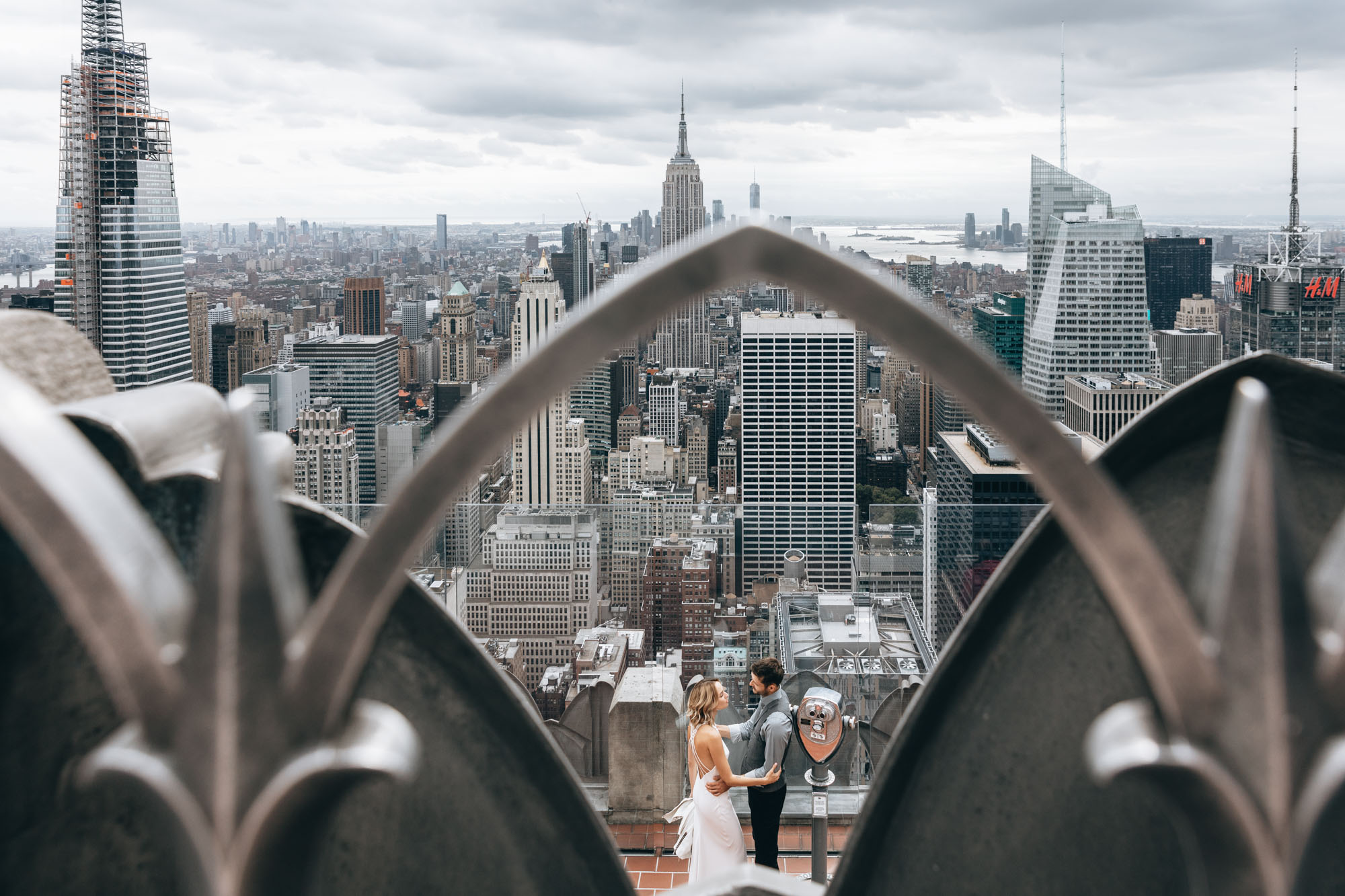 Bride and groom dancing together at Top of the Rock on their elopement wedding day. Manhattan NYC