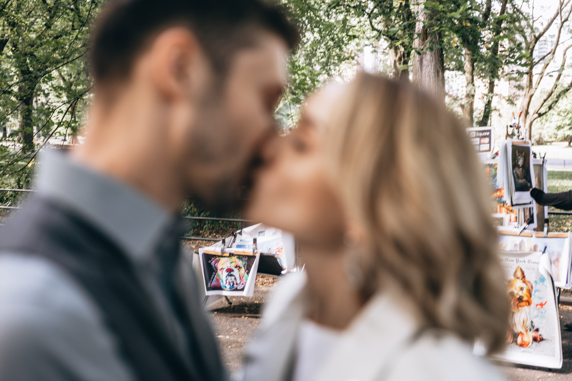 Bride and groom kissing in Central Park during their small elopement, Manhattan, NY
