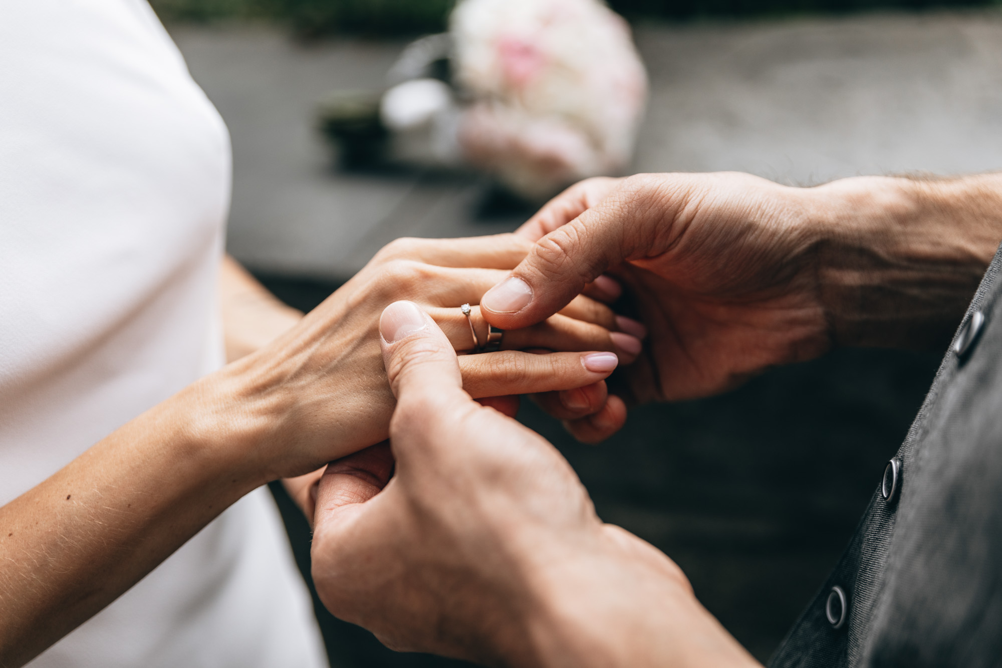 The ring exchange at a small elopement ceremony in Central Park, Manhattan, NYC