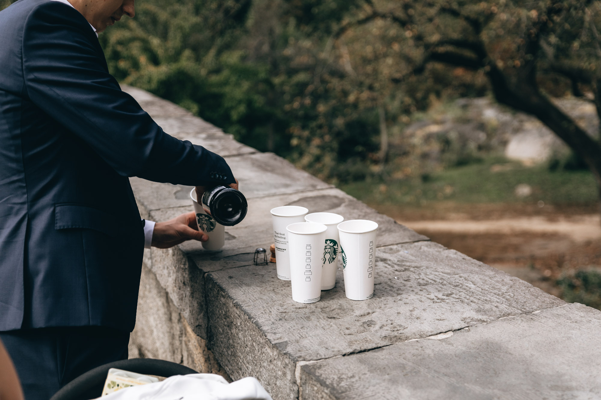 Celebrating with drinks at a small elopement ceremony in Central Park, Manhattan, NY