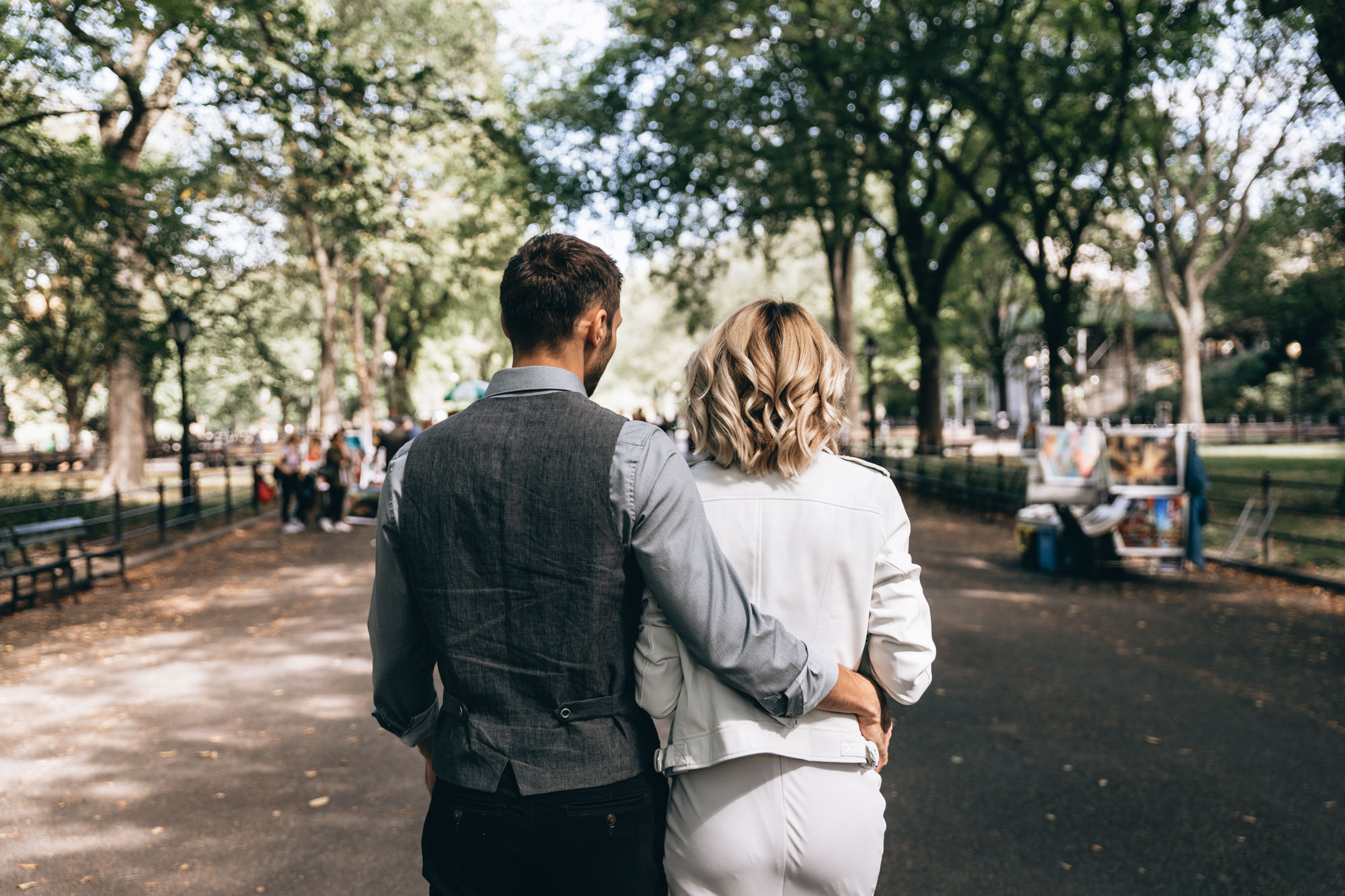 Bride and groom walking at the Mall in Central Park, Manhattan NY