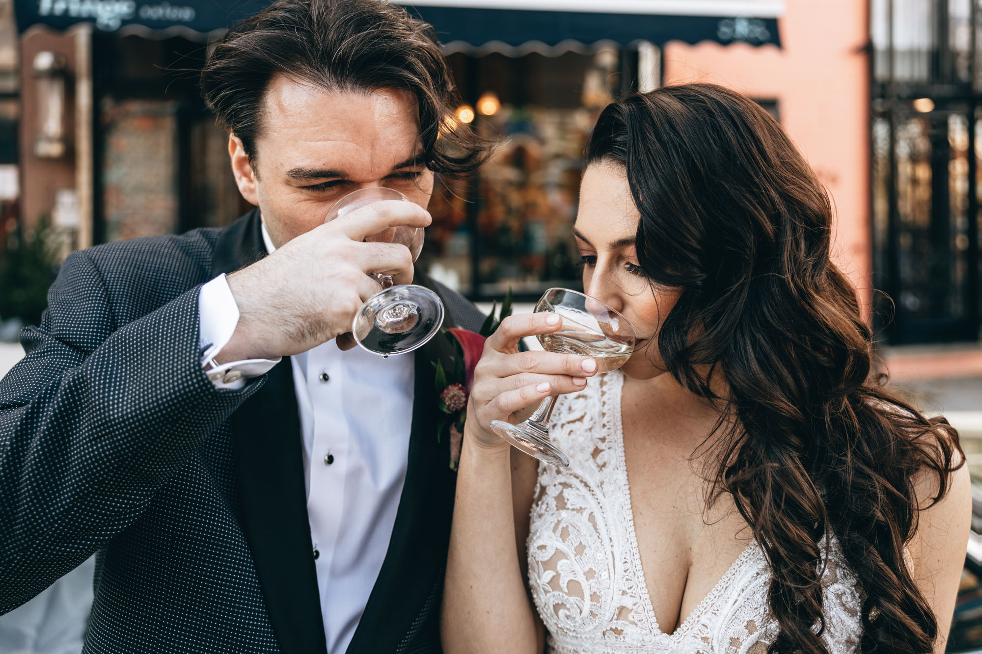 Bride and groom celebrating with drinks on their wedding day in Brooklyn NY