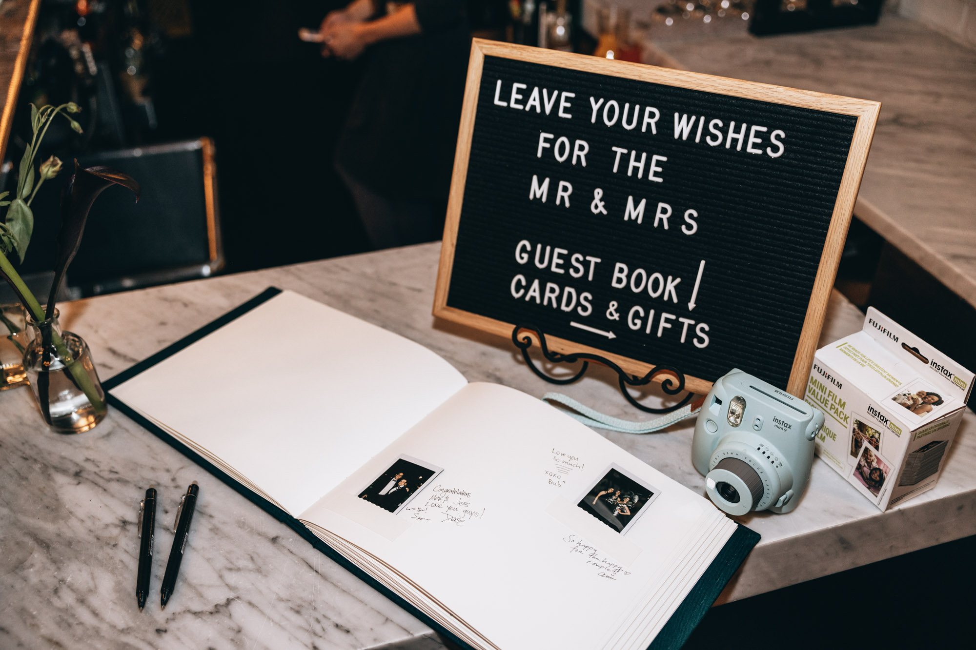 Guest book and polaroid camera at 501 Union, Brooklyn NY