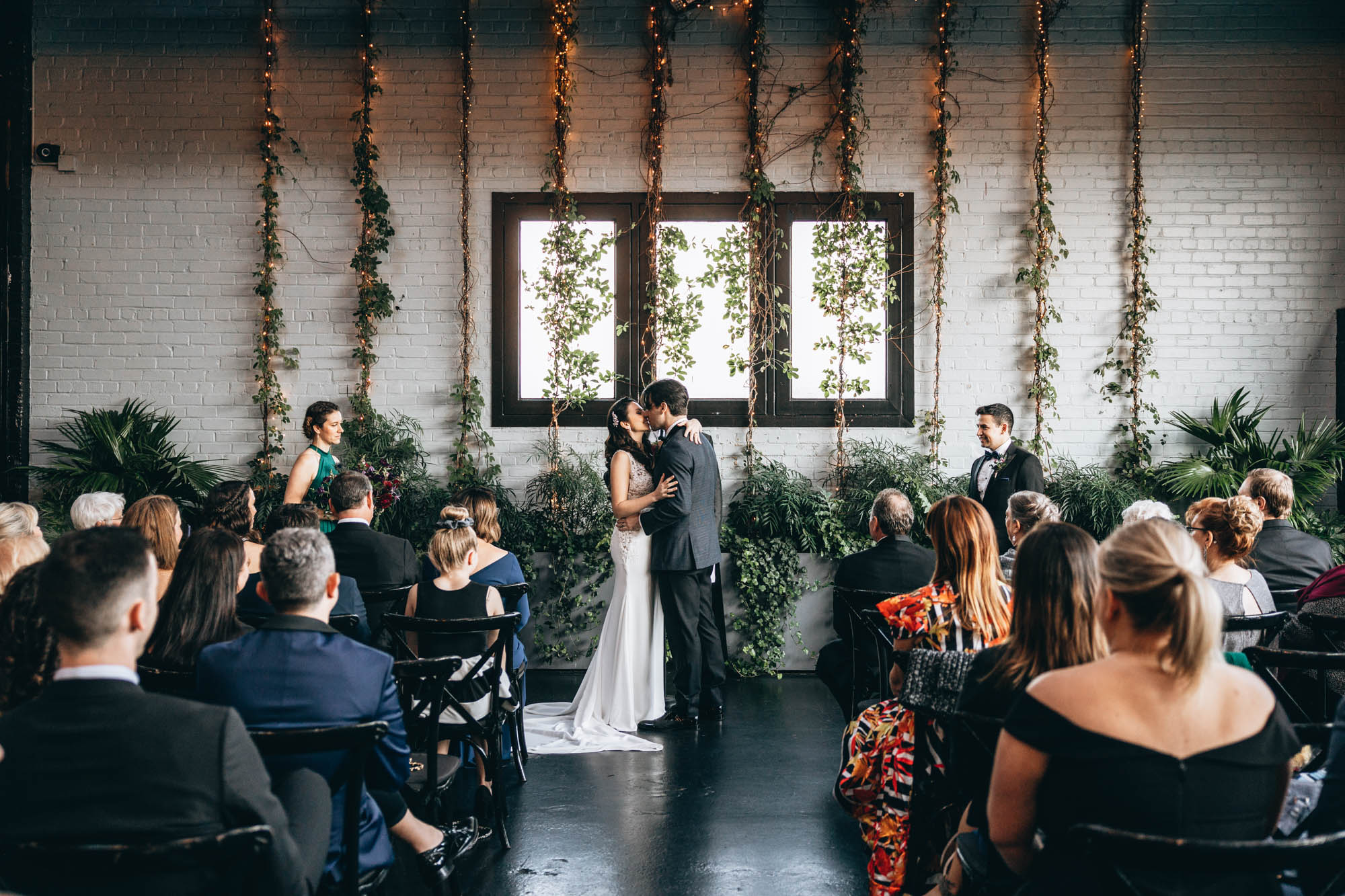 Bride and groom's first kiss at their 501 Union ceremony in Brooklyn NY