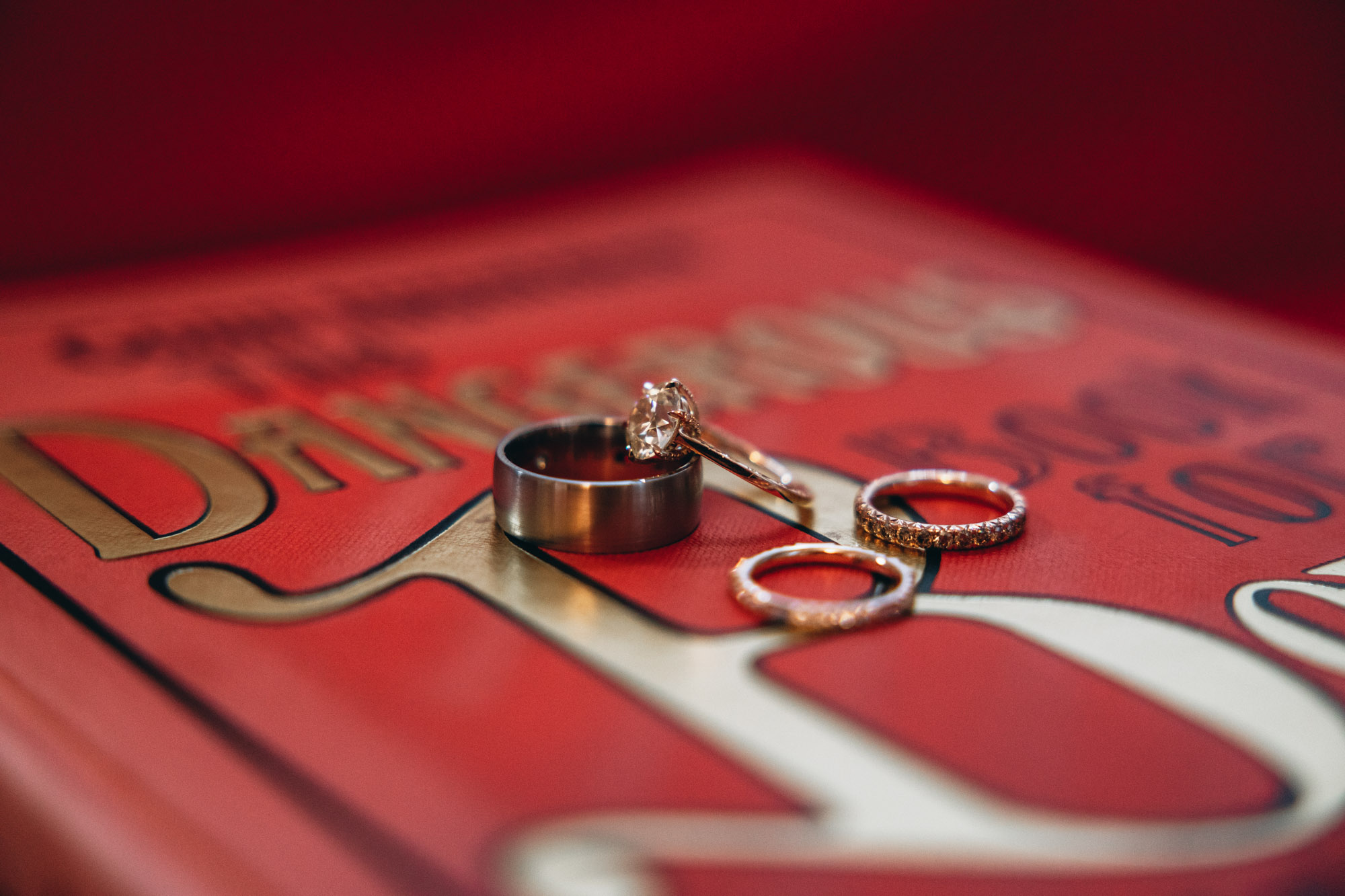 Detailed shot of wedding bands and rings on the morning of the wedding. Brooklyn, NY