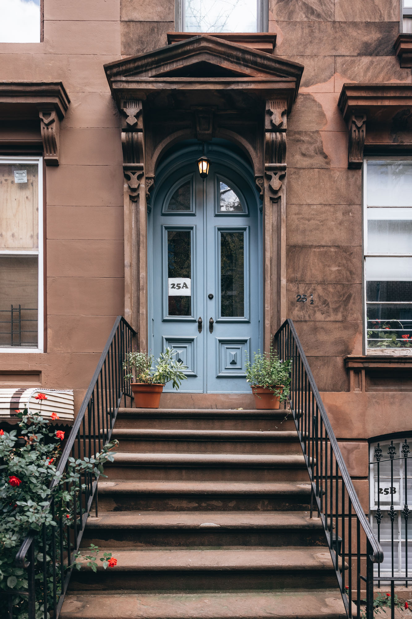 Blue door at a brownstone in Brooklyn, NY