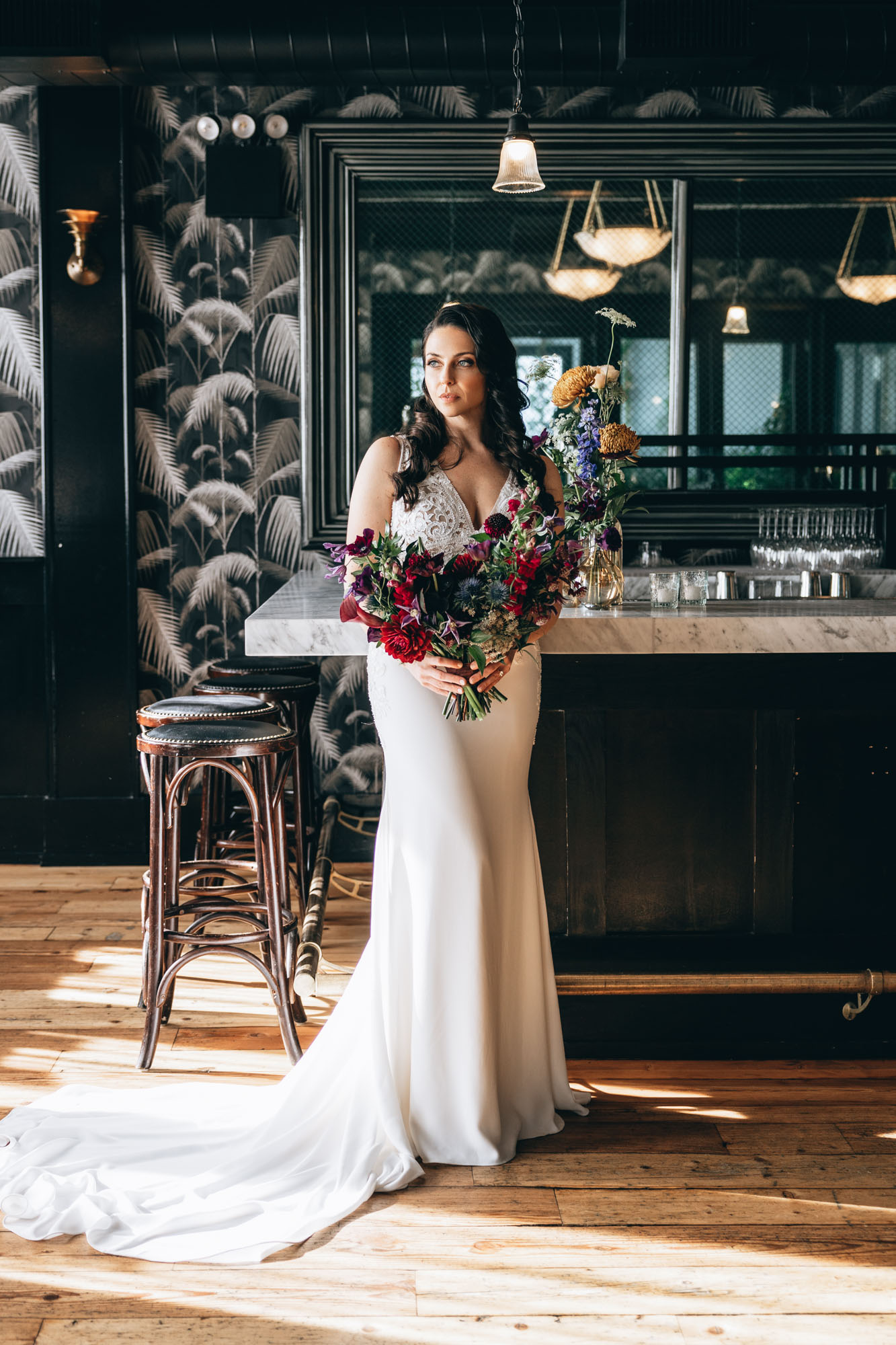 Stunning bride with dark and bold bouquet at the moody 501 Union, Brooklyn NY