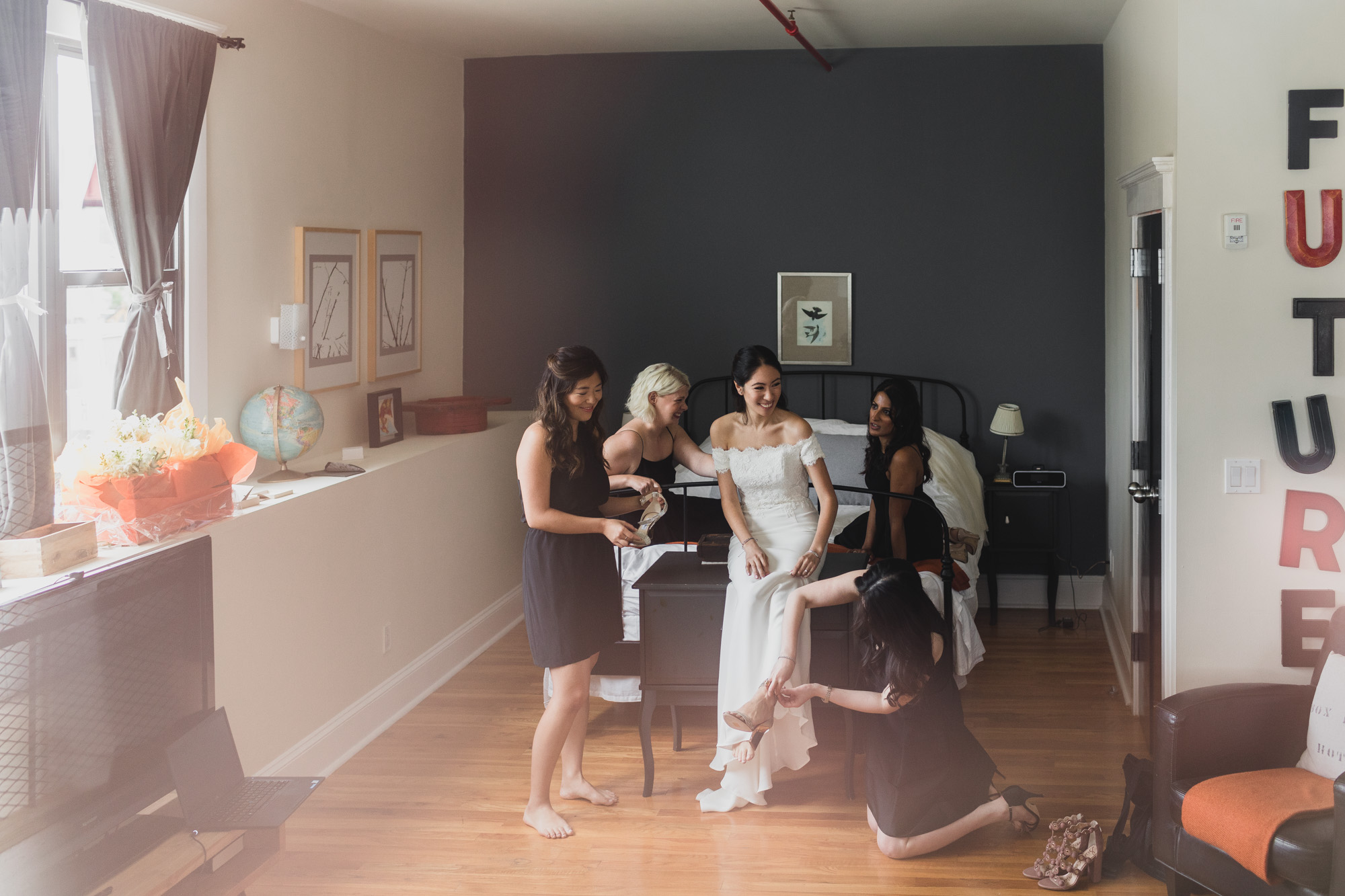 Bridesmaid helping bride to  get ready, Last touch ups. Wedding in Williamsburg, Brooklyn