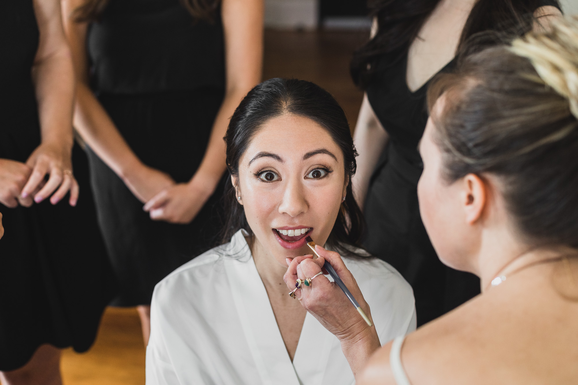Portrait of the bride getting ready, Last touch ups. Wedding in Williamsburg, Brooklyn