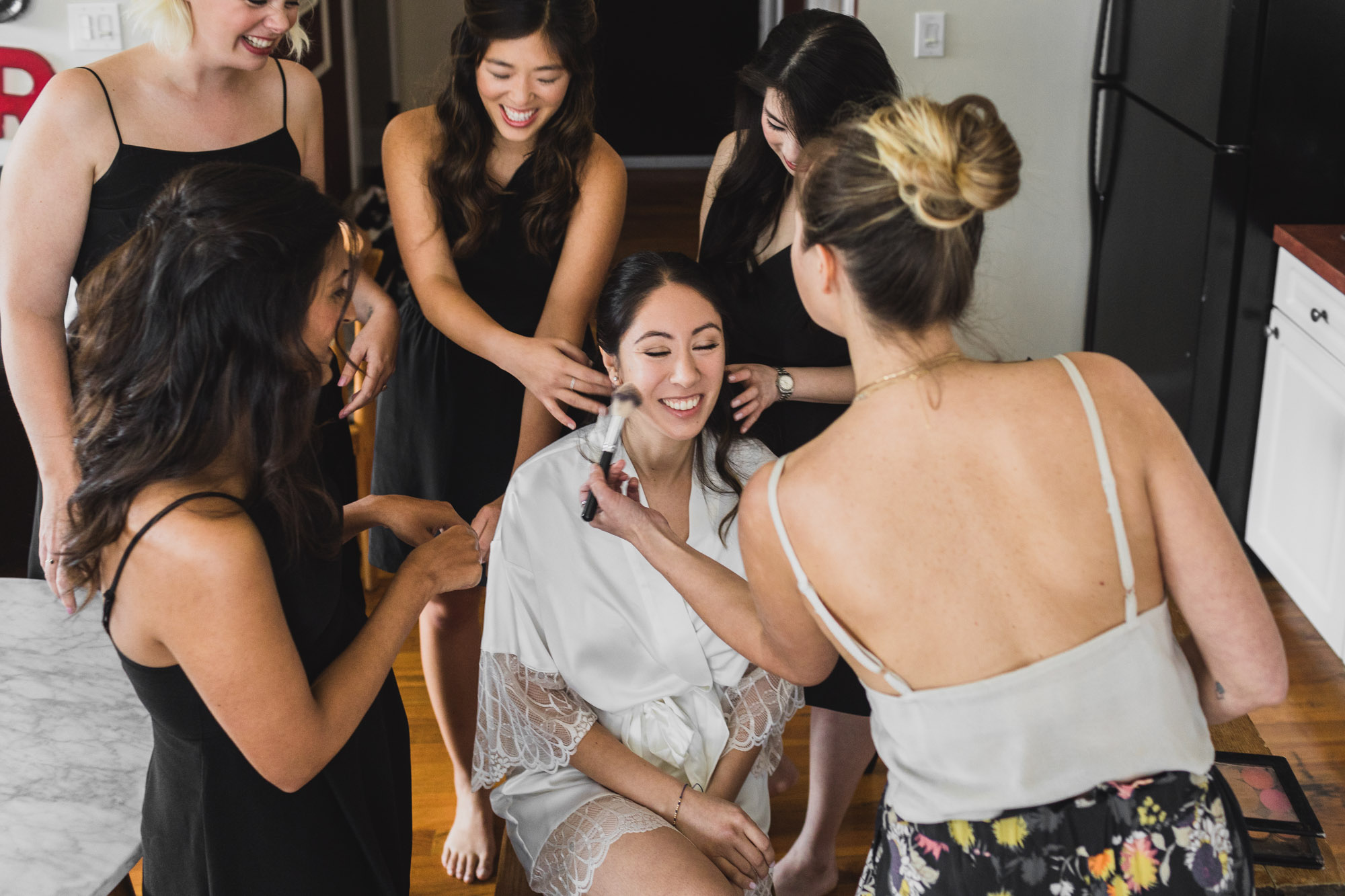 Portrait of the bride getting ready, Last touch ups. Wedding in Williamsburg, Brooklyn