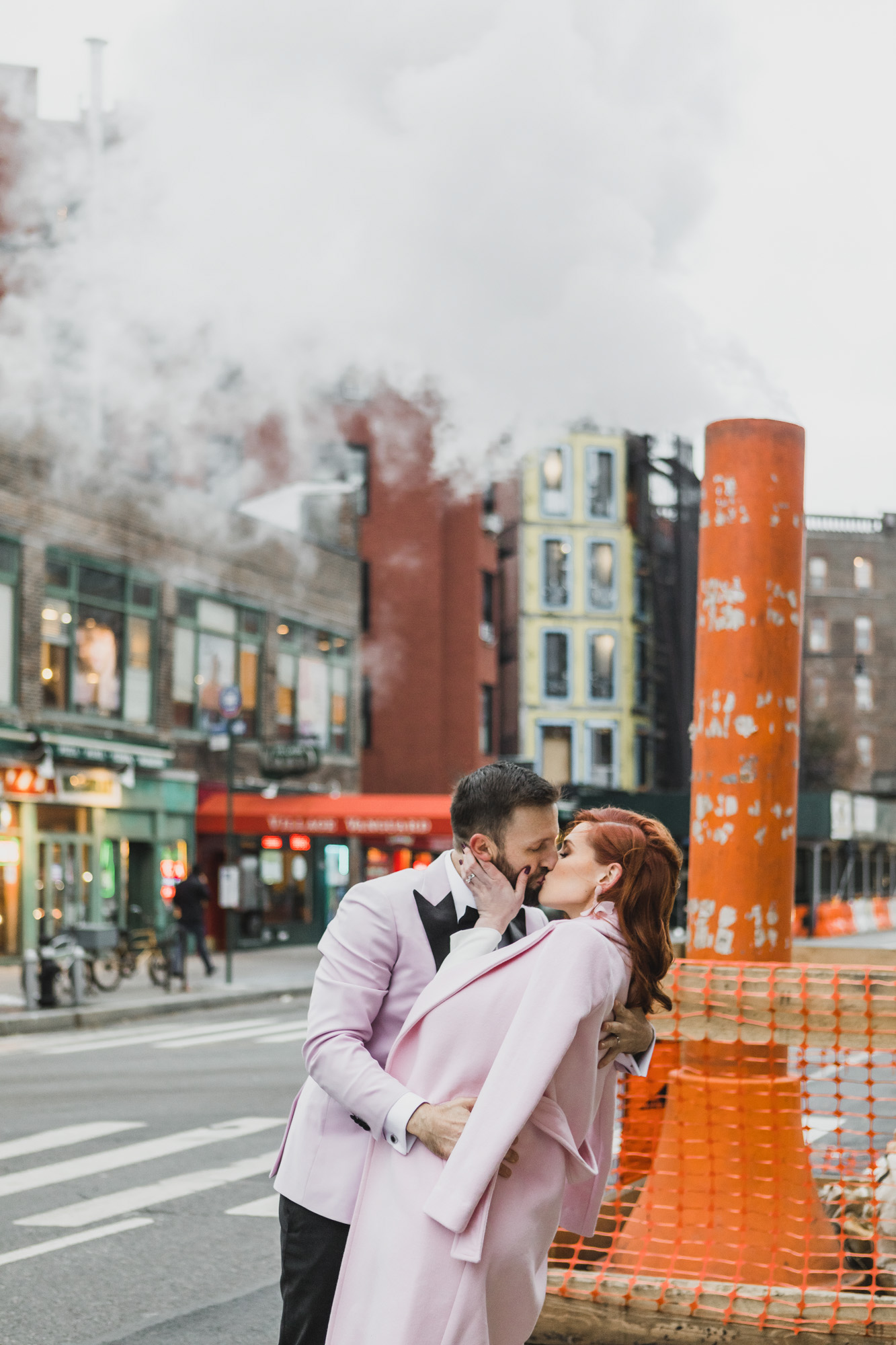 Aussie bride and groom kissing in the middle of the street. West Village, Manhattan NY
