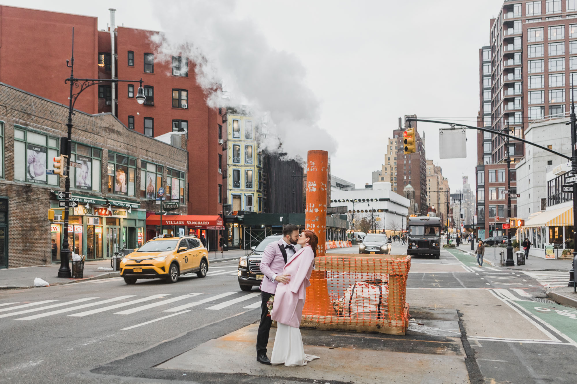 Aussie bride and groom kissing in the middle of the street. West Village, Manhattan NY