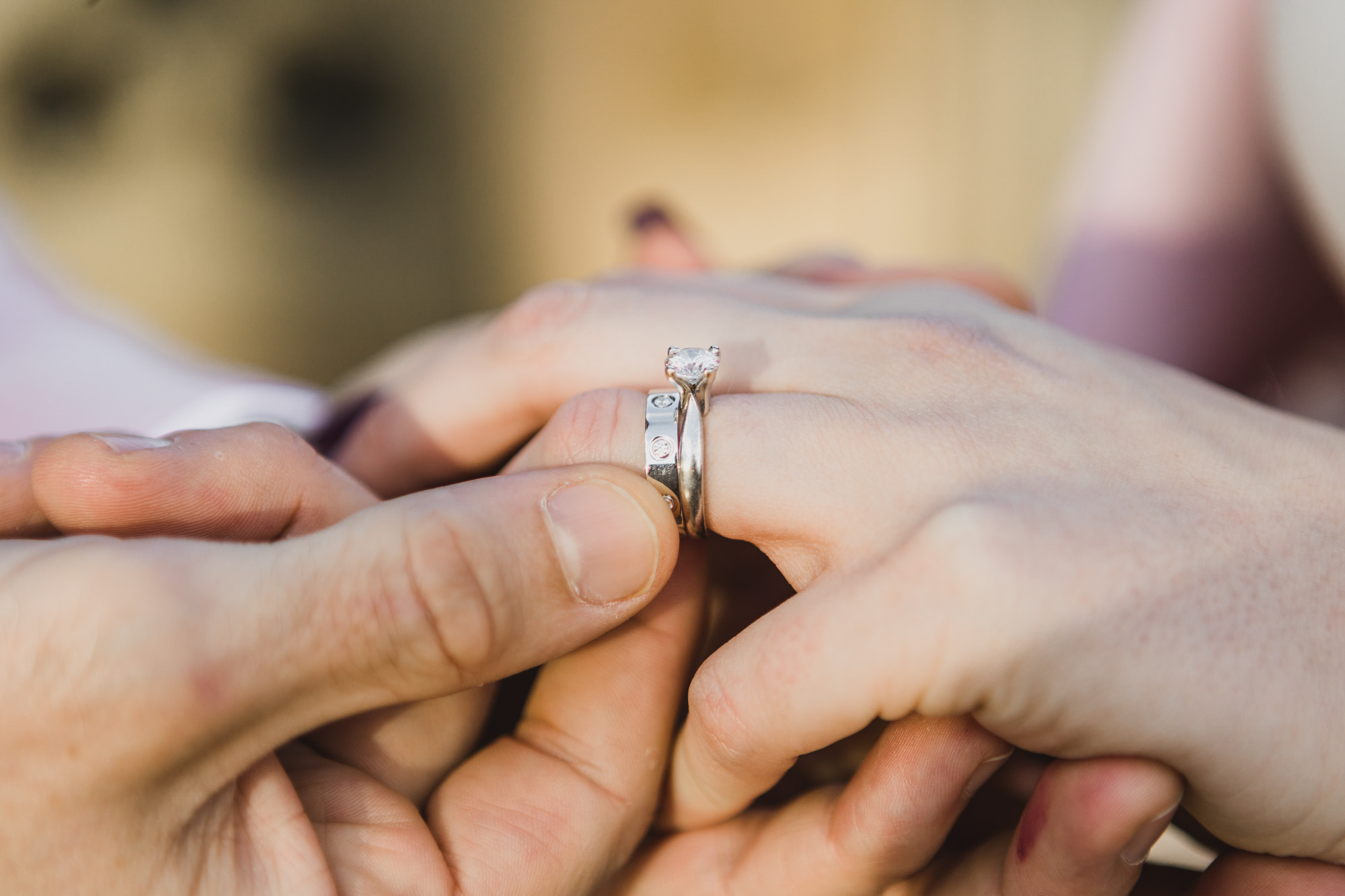Close up shot of wedding rings. Bethesda Fountain and Terrace, Central Park. Manhattan, NY