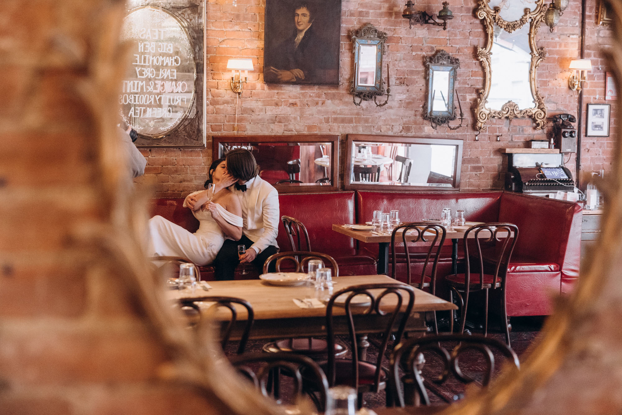 Stylish bride and groom kissing in Soho on their wedding day. Manhattan NY