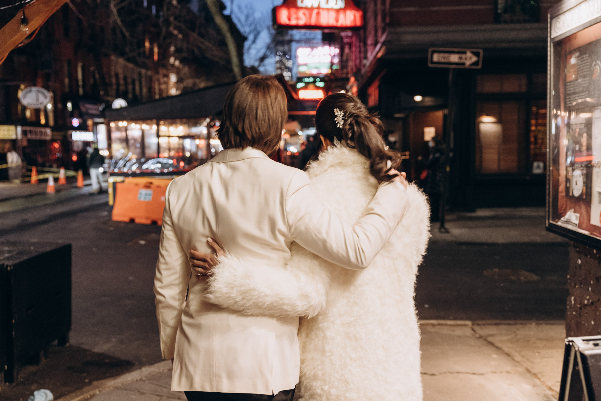 Bride and groom walking down the street during their winter elopement in West Village, Brooklyn NY