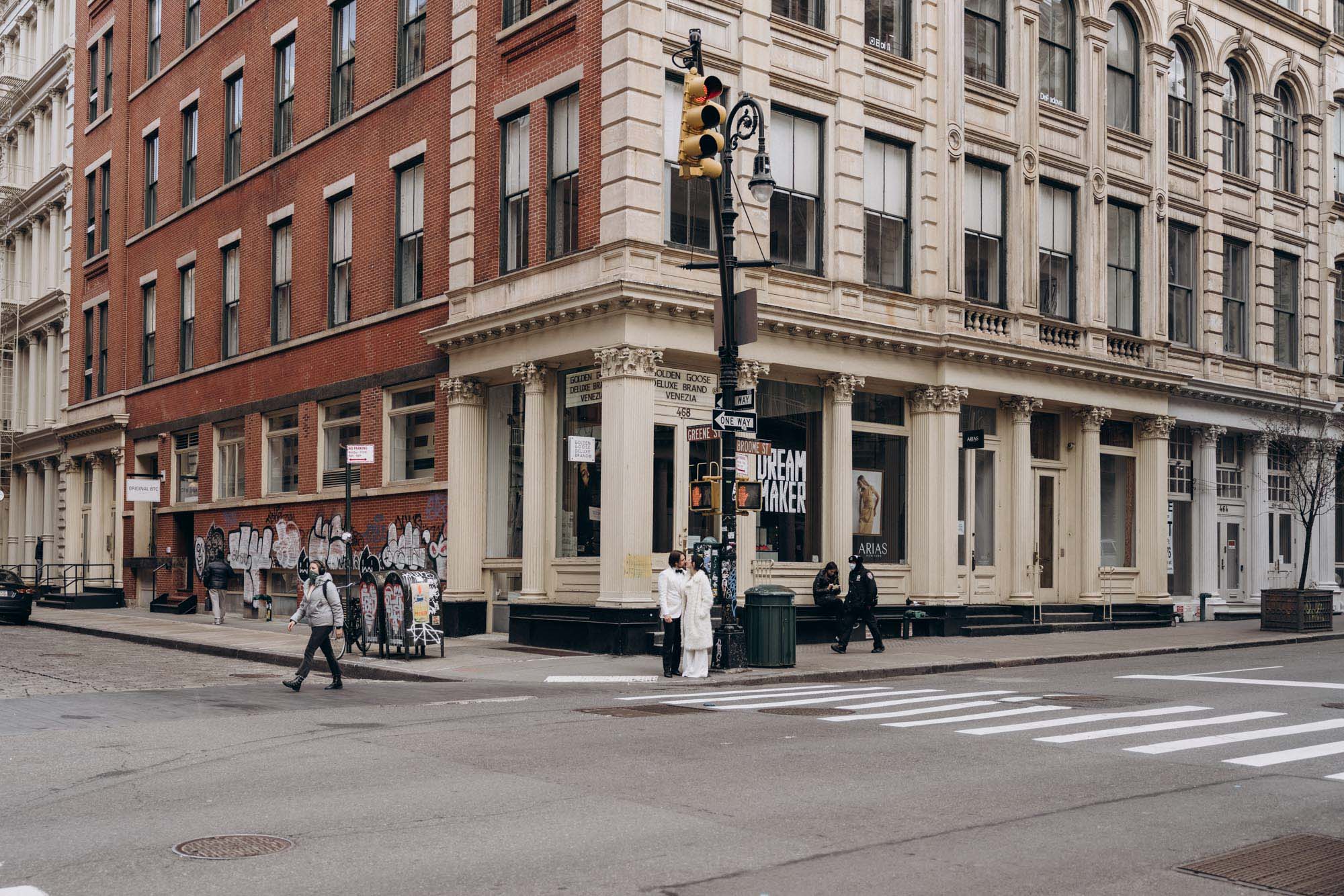 Stylish bride and groom during their winter elopement wedding day. Soho. Manhattan, NY