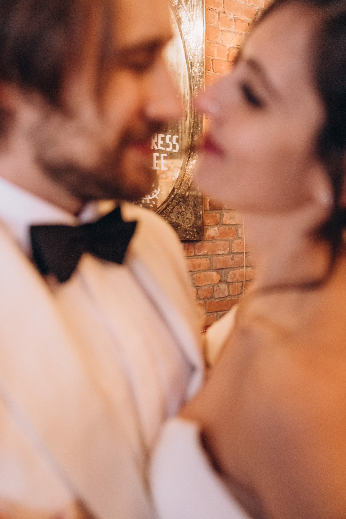 Bride and groom during their winter NYC elopement wedding day at a unique & vintage restaurant.. Soho, Manhattan, NY