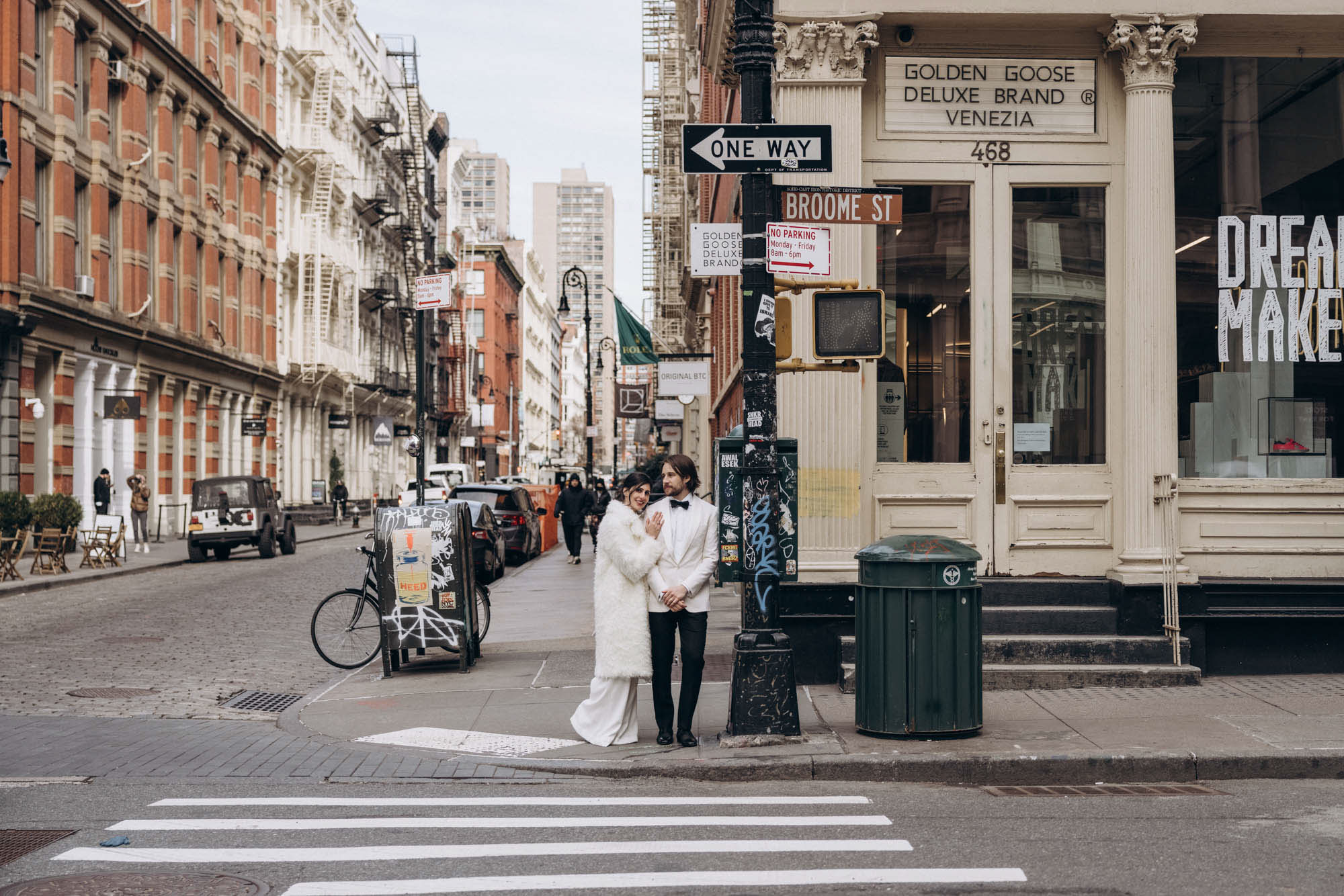 Stylish bride and groom during their winter elopement in Soho. Manhattan NY