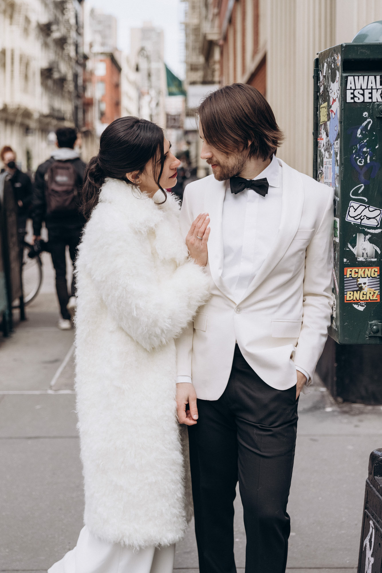Stylish bride and groom during their winter elopement wedding day. Soho. Manhattan, NY