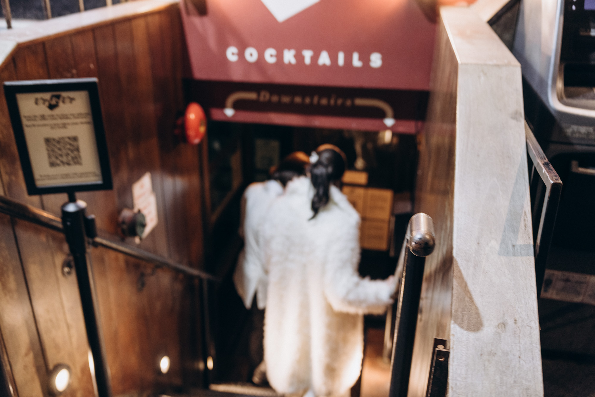 Bride and groom getting cocktails during their winter elopement. Manhattan NY
