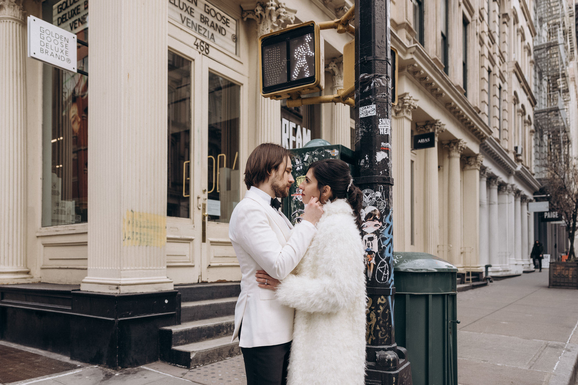 Stylish bride and groom during their winter elopement wedding day. Soho. Manhattan, NY