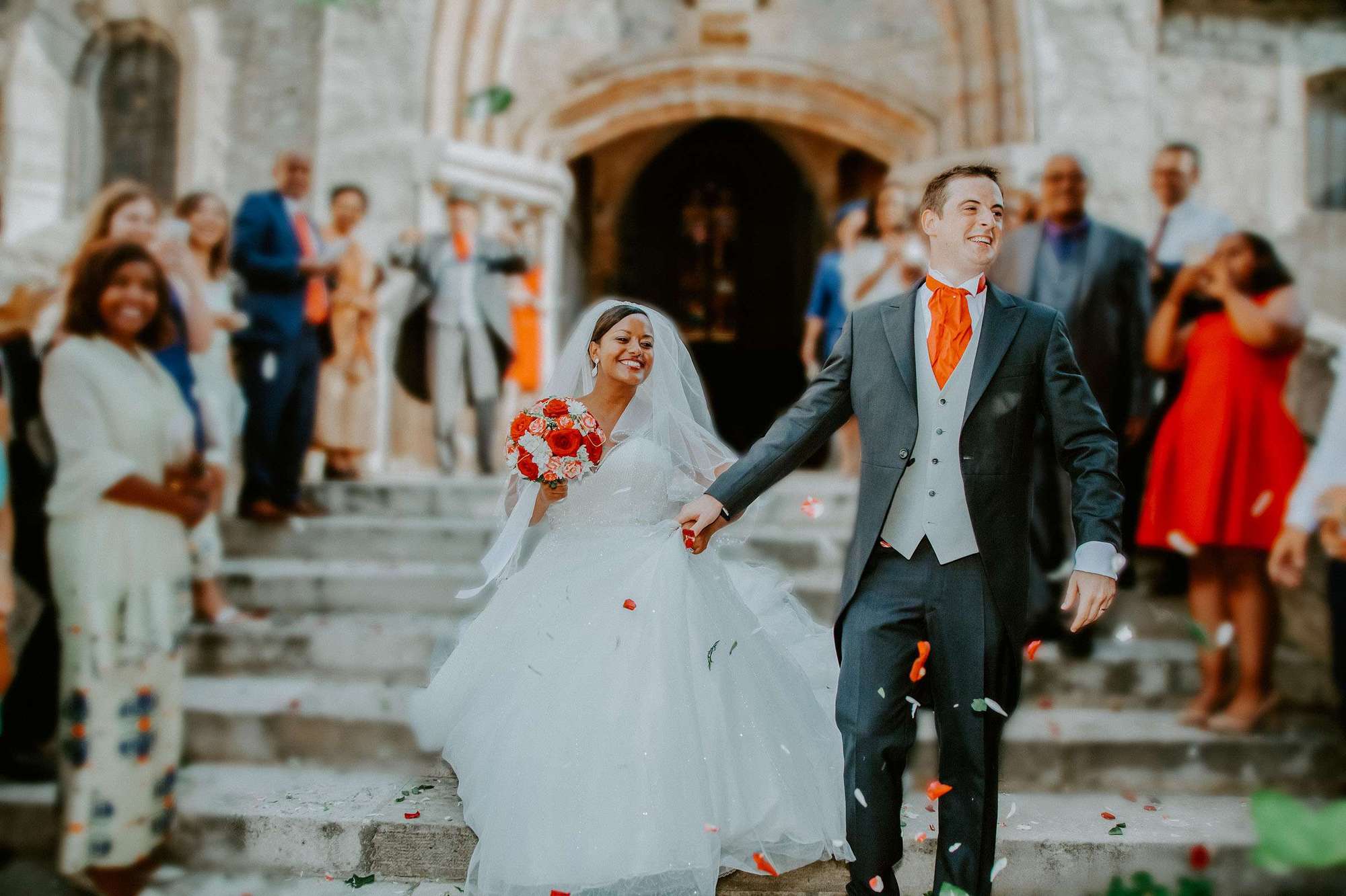 Professional wedding photographer France - Just married gorgeous couple coming out from the church