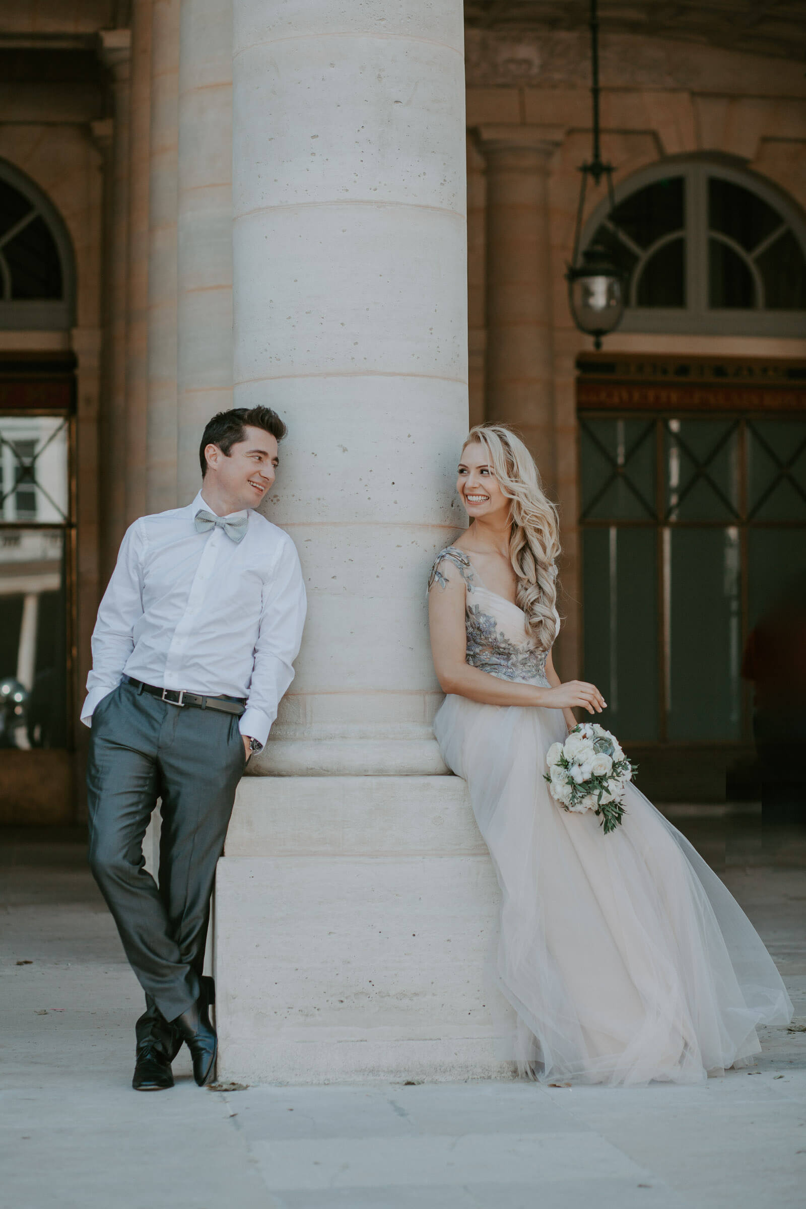 Wedding photo session - Just married couple looking at each other at Palais Royal in Paris